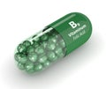 3d render of B9 folic acid pill with granules