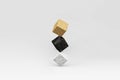 3d render of balancing cubes gold, black marble and white. Surrrealism in minimal style