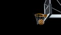 3d render Basketball hit the basket on a black background Royalty Free Stock Photo