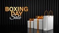 3D Render Boxing Day Sale Text With Realistic Gift Boxes, Shopping Bag On Black Stripe Background. Advertising Banner Royalty Free Stock Photo