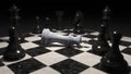 3d render of chess pieces on the board. The white king is defeated and lies surrounded by other pieces. Business concept Royalty Free Stock Photo