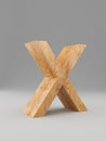 3D decorative wooden Alphabet, capital letter X. Isolated.