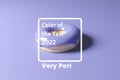 3d render of donut glazed with violet color of the year 2022 on a purple background