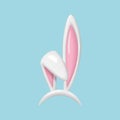 3d render Easter bunny ears mask. Realistic rabbit ears spring hat set isolated on blue background. Royalty Free Stock Photo