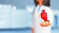 3D Render Of Female Doctor Protecting Heart On Blue Blurred