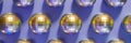 3d render of festive shiny dico balls pattern banner on a violet color of the year 2022 Royalty Free Stock Photo