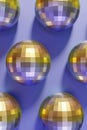 3d render of festive shiny dico balls pattern on a violet color of the year 2022 Royalty Free Stock Photo