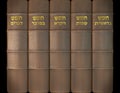 3D render of The five books of Moses in leather cover and golden