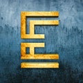 3D render of a golden letter E on the backdrop of a weathered blue surface