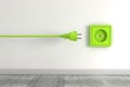 3D render of a green electrical plug near a socket- eco, green energy, environmental concept