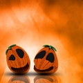 3D Halloween pumpkins on a grunge watercolour background