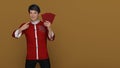3D Render :Handsome Asian smiling man with Chinese traditional dress male cheongsam or qipao holding ang pow