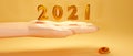 3d render of Happy New 2021 Year. Holiday realistic 3d sign of golden metallic numbers 2021 and ornamental shapes. Festive poster