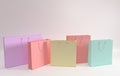 3D render illustration. Set of pastel colored paper shopping bags on white background. Concept of commercial business retail sale Royalty Free Stock Photo