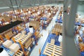 3D render Industrial racks, pallets, boxes, shelves with goods in huge storage rooms. Warehouse equipment, automotive warehouse,