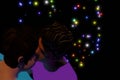 3D render Latino man proudly approaches to kiss his husband`s face at night of celebration with fireworks