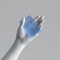 3d render, mannequin hand holding blank blue plastic card or pass ticket isolated on white background. Payment metaphor.