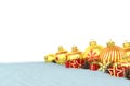 3d render - golden christmas baubles over white background Royalty Free Stock Photo