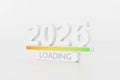 White 2026 with loading bar in clean studio scene, sleek Royalty Free Stock Photo