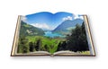 3D render of an opened photo book with a panorama of Lungern village (Switzerland - Europe)