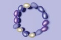 3d render of pastel colored Easter eggs wreath on a violet color of the year 2022 background Royalty Free Stock Photo