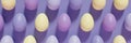 3d render of pastel colored violet, purple and yellow Easter eggs pattern banner on a violet background Royalty Free Stock Photo