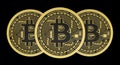 Bitcoins isolated on black background