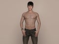 3D Render : Portrait of a shirtless young handsome asian man in green T-shirt and jeans