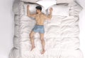 3D Render : The portrait of sleeping male character in the big white bed