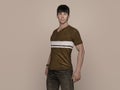 3D Render : Portrait of a smiling young handsome asian man in brown T-shirt and jeans Royalty Free Stock Photo