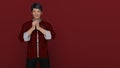 3D Render : Portrait of young Asian man in traditional Cheongsam chinese dress with gesture of congratulation on chinese new year Royalty Free Stock Photo