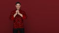 3D Render : Portrait of young Asian man in traditional Cheongsam chinese dress with gesture of congratulation on chinese new year Royalty Free Stock Photo