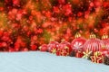 3d render - red christmas baubles over bokeh background Royalty Free Stock Photo