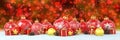 3d render - red and golden christmas baubles over bokeh Royalty Free Stock Photo