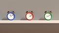 3D render - three multi-colored alarm clocks stand on a shelf. The alarms show the time of New York, Moscow and Tokyo Royalty Free Stock Photo