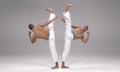 3D render : two men perform high kick action with Martial Arts Styles