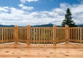 View from spruce wood terrace, porch or balcony on summer nature. Tree and hills