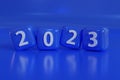 3d render year 2023 - cube plastic on blue background