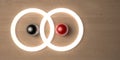 3D rendered background with luminous circles in the center of the balls black and red