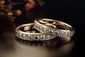 3D rendered gold diamond rings on a glossy background in a macro view