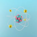 Elementary particles in atom on blue background. Physics concept Royalty Free Stock Photo