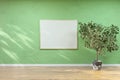 3d rendered illustration of a lage blank picture wall frame mockup in a hall with green wall