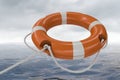 3D rendered illustration of orange life buoy. Sea in background