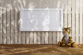 3d rendered illustration of a white picket fence with white mock up poster frame and stuffed toy tiger Royalty Free Stock Photo