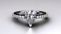 The elegance of a diamond ring, showcasing a captivating pear-cut gemstone