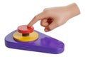 A hand presses a red button on a colorful device Royalty Free Stock Photo