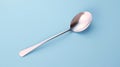Minimalist 3d Rendering Of Spoon On Blue Surface Royalty Free Stock Photo