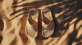 3D-rendered slippers are isolated against a sand background for use in product presentations Royalty Free Stock Photo