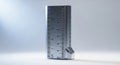 A 3D rendered tall rectangular metal ruler with a silver finish and black grid markings standing upright on a white surface Royalty Free Stock Photo