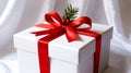 3D rendered white gift box, bright red satin ribbon, realistic lighting Royalty Free Stock Photo